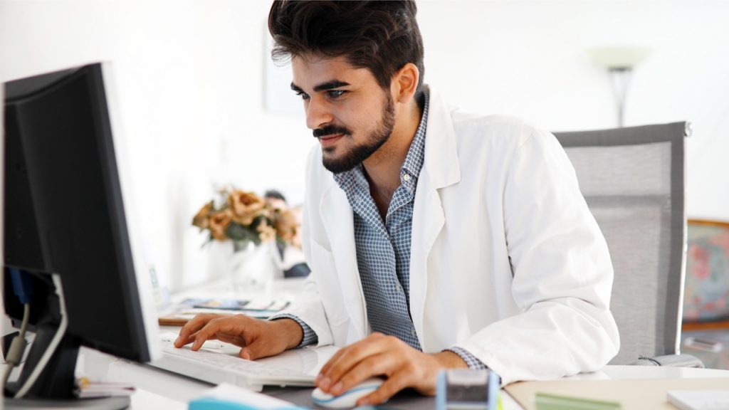 Medical student on computer